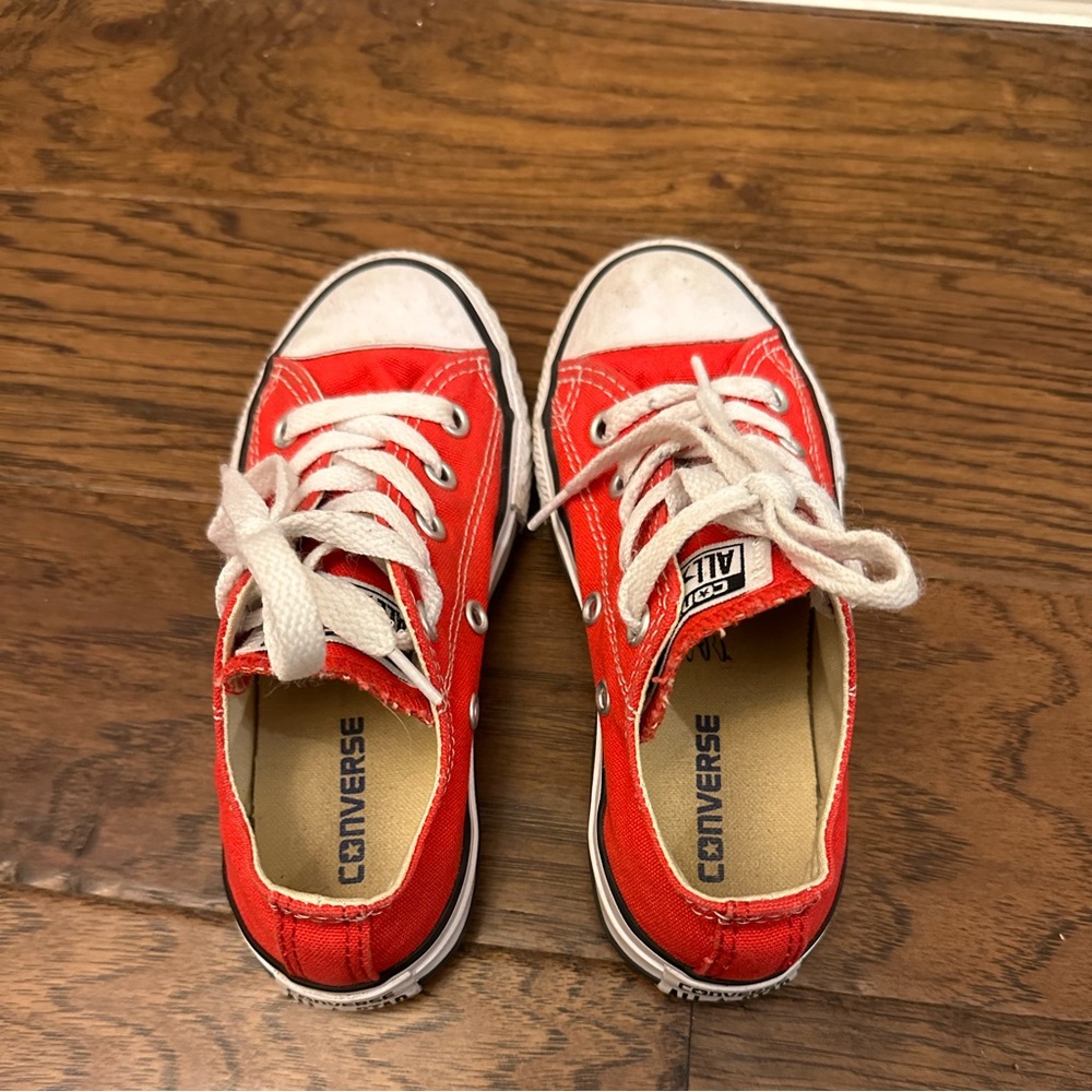 Red Converse tennis shoes